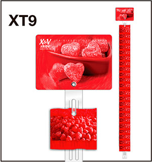XT9 es una tira exhibidora fabricada en PVC 24 ganchos con copete impresión digital. Reforsado con ojillos niquelados